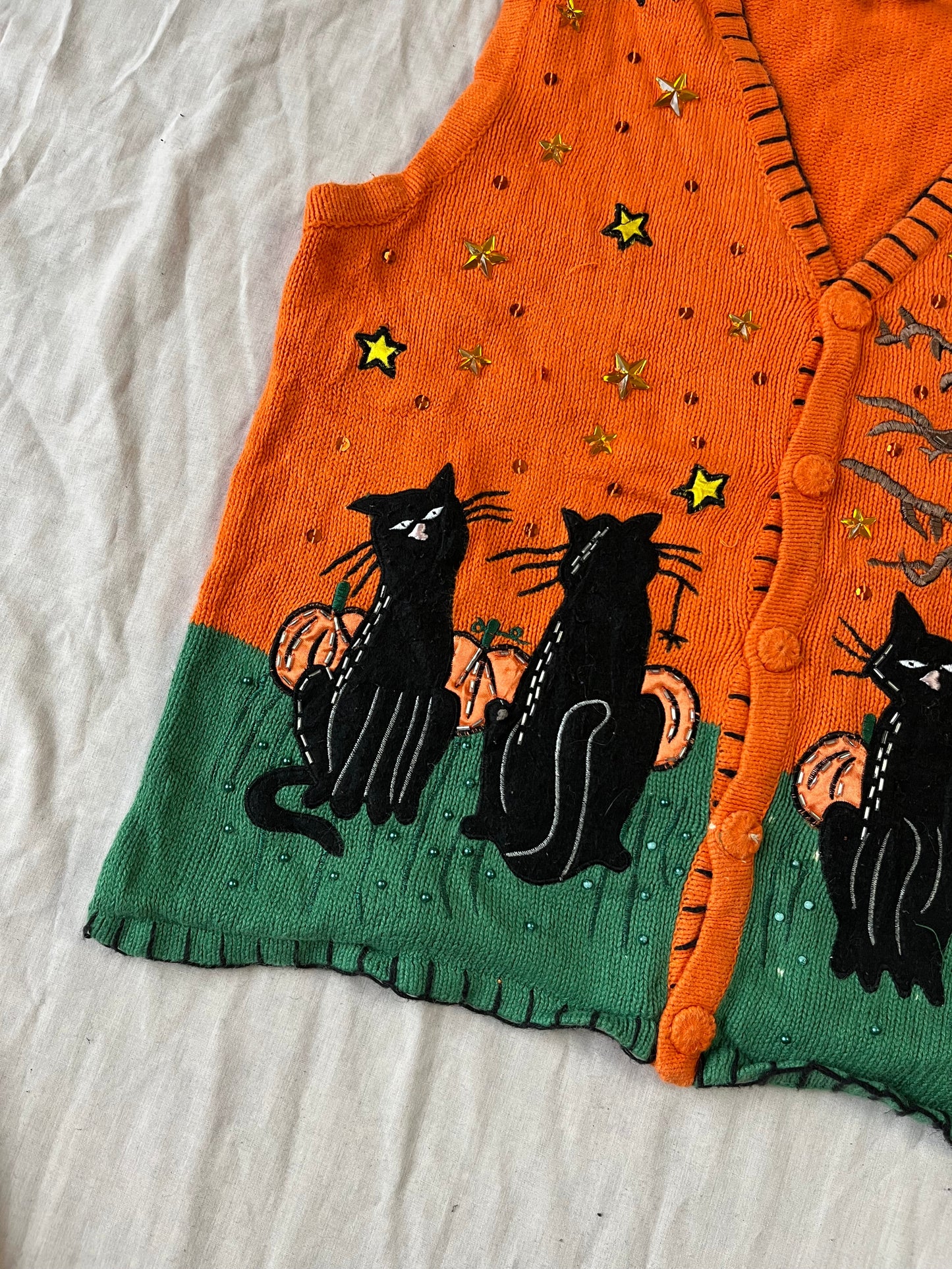 The Familiar 1990s Halloween Sweater Vest L